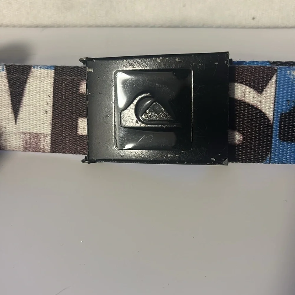 1 Under Armour Kids' Black and White Belt and 2 Quicksilver Belt! Set of 3